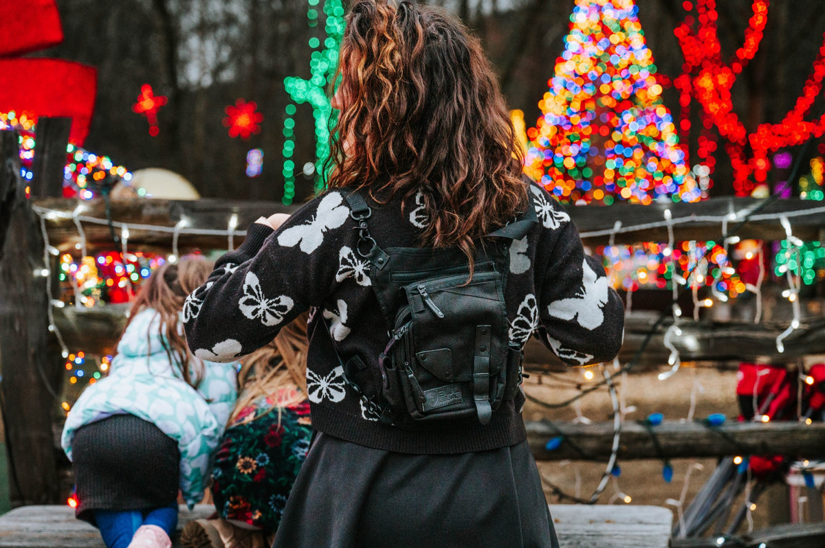Load video: Worn as a backpack at the Christmas lights