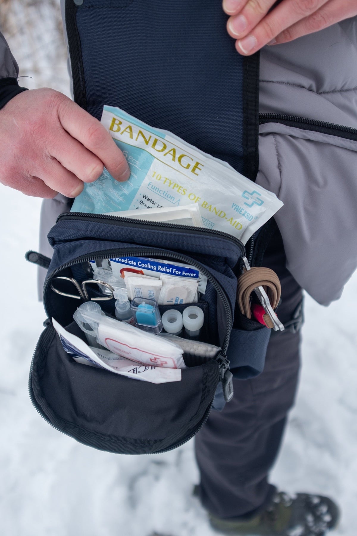 Saddleback in Navy open with first aid supplies
