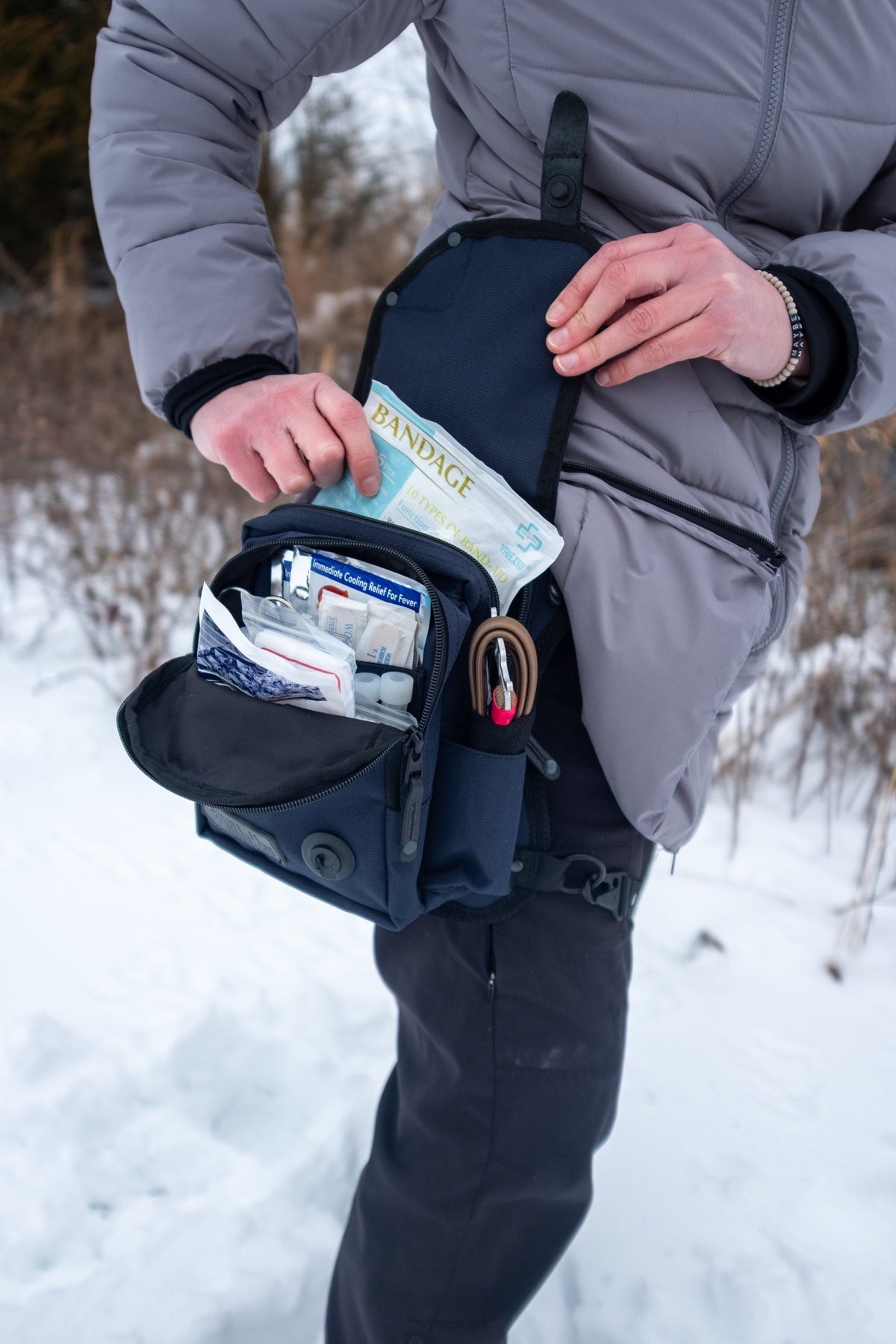 Saddleback in Navy worn on the hip